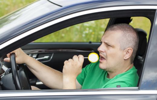 A person may put snacks in his or her car to ensure that hunger is not experienced if he or she gets stuck in traffic.