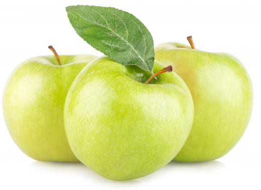 "There are three green apples" is a declarative sentence that states a fact.