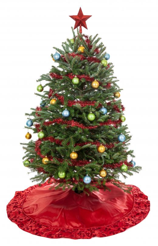 A child may be described as "chomping at the bit" to open presents under a Christmas tree.