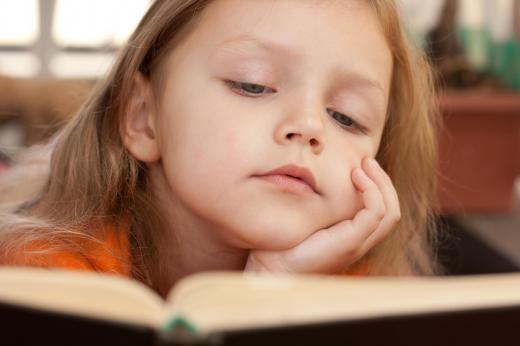 Children will often pretend to read when literacy is just beginning to emerge.