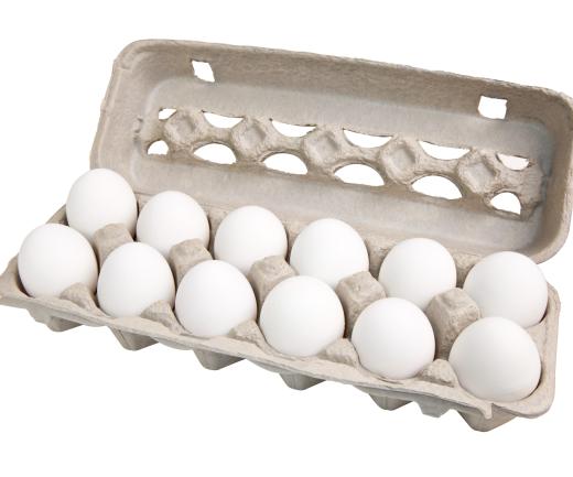 A carton of a dozen eggs. Although eggs are common and inexpensive, they do cost more than a dime a dozen.