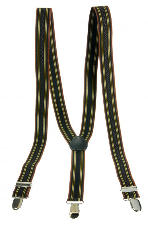 Wearing suspenders as well as a belt would be superfluous, so the phrase "belt and suspenders" refers to being overly cautious.