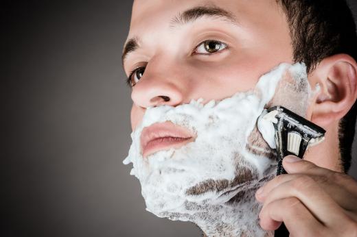 Men shave their face as close as possible without irritating the skin.